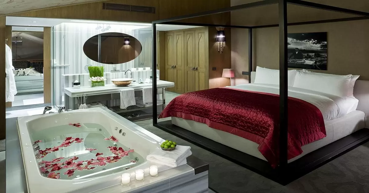 a hotel room-with-a jacuzzi-in-it