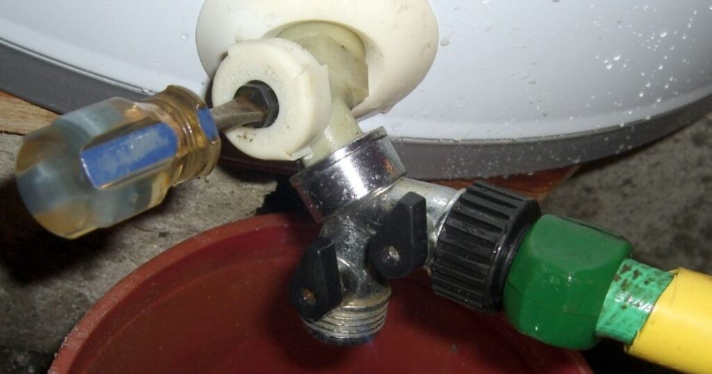 Locate and Access the Drain Valve